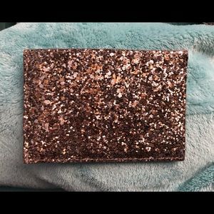 Gold/cityscape glitter card holder from Kate Spade